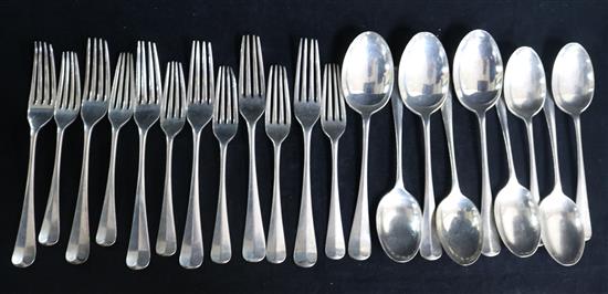 A part canteen of 1030s silver Hanovarian (rat-tail) pattern flatware by Roberts & Belk, Sheffield, 1934, 36 oz.